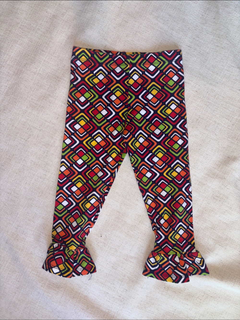 Bonnie Jean Black Multicolor Geo Print Ruffle Hem Leggings
